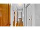 Hallway featuring hardwood floors and wood trim at 220 19Th S Ave, St Petersburg, FL 33705