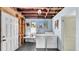 Laundry room with washer, dryer, utility sink, and storage at 220 19Th S Ave, St Petersburg, FL 33705