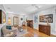 Inviting living room with hardwood floors, brick fireplace, and natural light, creating a cozy and elegant atmosphere at 220 19Th S Ave, St Petersburg, FL 33705