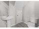 Small half bathroom with pedestal sink and updated fixtures at 246 Castlekeeper Pl, Valrico, FL 33594