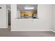 Bright kitchen area with breakfast bar and stainless steel appliances at 246 Castlekeeper Pl, Valrico, FL 33594
