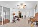 A versatile living area with tile flooring, leading to a kitchen and other living spaces at 2469 Franciscan Dr # 19, Clearwater, FL 33763