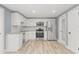 Beautiful updated kitchen featuring modern stainless appliances, granite counters, and stylish cabinetry at 2616 Ohio Pl, Holiday, FL 34691