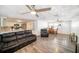 Open floor plan with tile flooring, kitchen, dining area and spacious living room at 3422 Trask Dr, Holiday, FL 34691