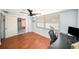 Home office with hardwood floors, a ceiling fan, and natural light at 3422 Trask Dr, Holiday, FL 34691