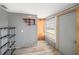 View of the room with storage and a door to the exterior at 3422 Trask Dr, Holiday, FL 34691