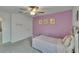 Bedroom featuring a closet and a window at 34780 Rainville Loop, Zephyrhills, FL 33541