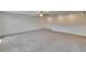 Spacious living room with carpet floors and recessed lights at 34780 Rainville Loop, Zephyrhills, FL 33541