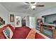 Carpeted main bedroom with lots of storage and adjacent to the bathroom and walk-in closet at 34780 Rainville Loop, Zephyrhills, FL 33541