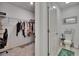 Large walk-in closet with a desk and carpet floors at 34780 Rainville Loop, Zephyrhills, FL 33541