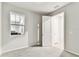 Inviting bedroom with ample natural light, neutral walls, and a carpeted floor at 3764 Laughing Dove Ave, Sun City Center, FL 33573