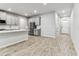 Spacious kitchen with an island, stainless steel appliances, and an open layout at 3764 Laughing Dove Ave, Sun City Center, FL 33573