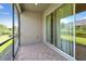 Inviting screened patio with brick flooring, ideal for enjoying the outdoors in comfort at 3764 Laughing Dove Ave, Sun City Center, FL 33573