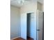 A neutral-colored bedroom contains a closet with sliding doors and a door to the hallway at 3851 72Nd N St, St Petersburg, FL 33709
