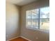 This bedroom features a large window and vinyl flooring at 3851 72Nd N St, St Petersburg, FL 33709