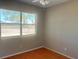 This bedroom features a laminate floor and plenty of light from the large window at 3851 72Nd N St, St Petersburg, FL 33709