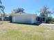 One story home featuring neutral exterior paint and an enclosed porch at 3851 72Nd N St, St Petersburg, FL 33709