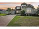 Charming two-story house with well-maintained lawn and welcoming curb appeal at 3952 Bonfire Dr, Odessa, FL 33556