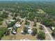 Aerial view of the neighborhood highlighting the property's location among trees and residences at 4416 Tevalo Dr, Valrico, FL 33596