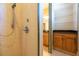 Updated bathroom with shower and storage at 4416 Tevalo Dr, Valrico, FL 33596