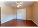 Bedroom featuring a ceiling fan and hardwood floors at 4416 Tevalo Dr, Valrico, FL 33596