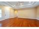 Bright and open living room with hardwood floors and a tray ceiling at 4416 Tevalo Dr, Valrico, FL 33596