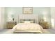 Cozy bedroom with a king-size bed, neutral tones, and stylish nightstands and lamps for a relaxing ambiance at 4470 Southern Valley Loop, Brooksville, FL 34601