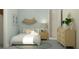 Charming bedroom with a twin bed, stylish nightstand, and decorative artwork for a cozy retreat at 4470 Southern Valley Loop, Brooksville, FL 34601