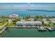 Stunning aerial view of waterfront condos with boat docks and resort amenities at 4816 Snook Se Dr # F, St Petersburg, FL 33705