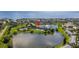 Beautiful aerial view of condo buildings nestled by a lake, with scenic waterfront views at 4816 Snook Se Dr # F, St Petersburg, FL 33705