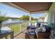 Relaxing balcony with comfortable seating and a stunning lake view at 4816 Snook Se Dr # F, St Petersburg, FL 33705