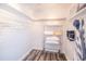 Bright closet with organized shelving, storage, and neutral paint at 4816 Snook Se Dr # F, St Petersburg, FL 33705