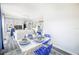 Spacious dining room and living room combination with plenty of natural light at 4816 Snook Se Dr # F, St Petersburg, FL 33705