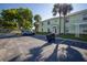 Exterior of the townhome features reserved parking in front of well-maintained grounds at 4816 Snook Se Dr # F, St Petersburg, FL 33705