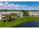 Lovely waterfront condos with well-maintained lawns and lush tropical landscaping at 4816 Snook Se Dr # F, St Petersburg, FL 33705