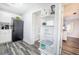 Compact kitchen featuring stainless steel appliances and bright white cabinets at 4816 Snook Se Dr # F, St Petersburg, FL 33705