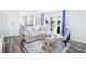 Cozy living room with stylish decor, wood floors and natural light at 4816 Snook Se Dr # F, St Petersburg, FL 33705