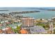 Aerial view shows the complex with community pool and easy water access at 4900 Brittany S Dr # 211, St Petersburg, FL 33715