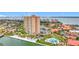 Aerial view of a condominium community with a swimming pool and marina on the water at 4900 Brittany S Dr # 211, St Petersburg, FL 33715