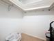 Spacious walk-in closet with ample hanging space and shelving, perfect for organizing clothes and accessories at 4900 Brittany S Dr # 211, St Petersburg, FL 33715
