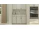 Modern kitchen with white cabinets, granite countertops, and stainless steel appliances at 4923 Southern Valley Loop, Brooksville, FL 34601