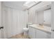 Bathroom featuring shower and tub combo and vanity at 4991 Puritan Cir # 522, Tampa, FL 33617