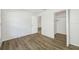 Bedroom with closet featuring wood-look floors at 4991 Puritan Cir # 522, Tampa, FL 33617