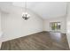 Open living area with high ceilings and sliding glass door at 4991 Puritan Cir # 522, Tampa, FL 33617