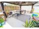 Relaxing backyard patio with cozy gazebo, comfortable seating area and lush potted plants, perfect for outdoor enjoyment at 518 Greg St, Valrico, FL 33594