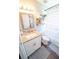 Charming bathroom featuring a white vanity, granite countertop, and a stylish shower curtain at 518 Greg St, Valrico, FL 33594