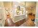 Open-concept kitchen featuring stainless steel appliances, granite countertops, and seamless flow to dining area at 518 Greg St, Valrico, FL 33594