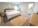Cozy bedroom with a comfortable bed, soft rug, and natural light at 518 Greg St, Valrico, FL 33594