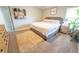 Serene bedroom with a plush rug, accent wall, and inviting decor at 518 Greg St, Valrico, FL 33594