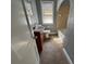 Bathroom with vanity, toilet and tub/shower combo and tiled floors, ready for updates and personalization at 536 89Th N Ave, St Petersburg, FL 33702